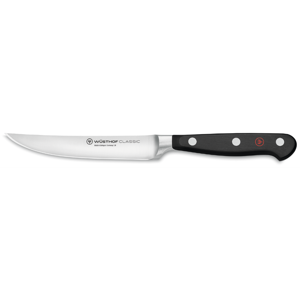 Wusthof knife with a black handle on a white background