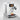 Jura E10 in Piano White from above, angled to the right, with a coffee