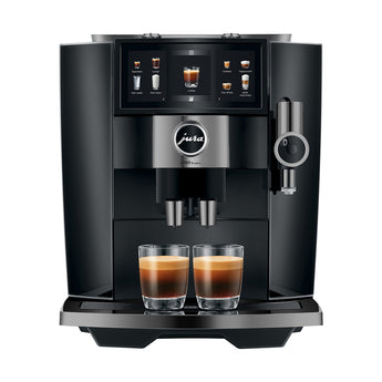 Jura J10 twin in Diamond Black, front view, with two espressos
