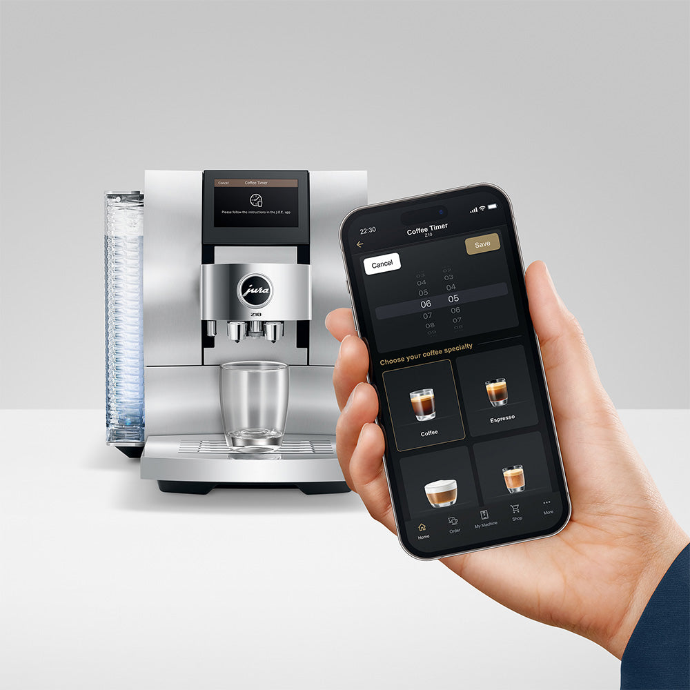 Jura Z10 Gen 2 Aluminum White with the J.O.E. app on a phone