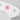 Close-up of the white handle of a WÜSTHOF CLASSIC knife, with its red trident logo