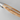 Close-up of a WÜSTHOF AMICI handle from the spine side, showing the tang running through the wood