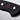 Close-up of the end of the black handle of a WÜSTHOF CLASSIC knife, with its rivets and red trident logo