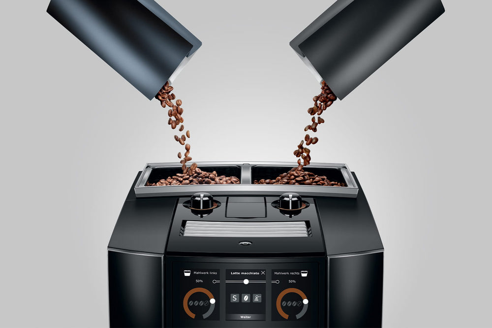 Jura J8 twin in Diamond Black, coffee beans poured into both bean containers