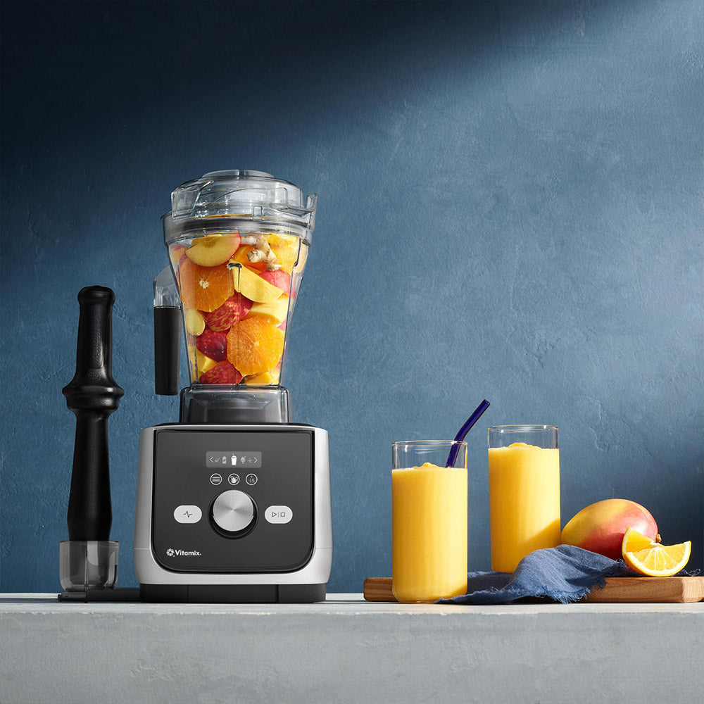 Vitamix Ascent X5 Blender in Polar White with fruit and mango smoothies