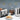 Dualit Design Series kettle and 4-slice toaster with pine cones, candles and a gold garland
