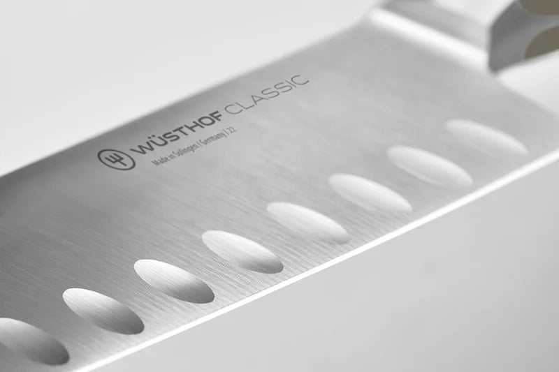 Wüsthof CLASSIC 7" Hollow Edge Santoku, White - Controlled Cutting with a Broad Santoku Blade