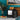 Dualit Classic 2-slice toaster in matt black with toast on a marble counter against a teal panelled wall, with jam on toast and eucalyptus