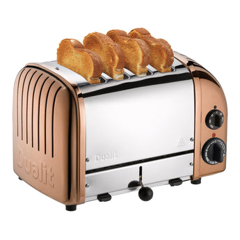 Dualit Classic 4-slice toaster in copper with toast in the slots, on a white background