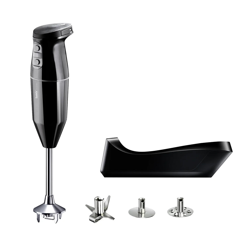 bamix Cordless in black with its charging base and three stainless steel attachments