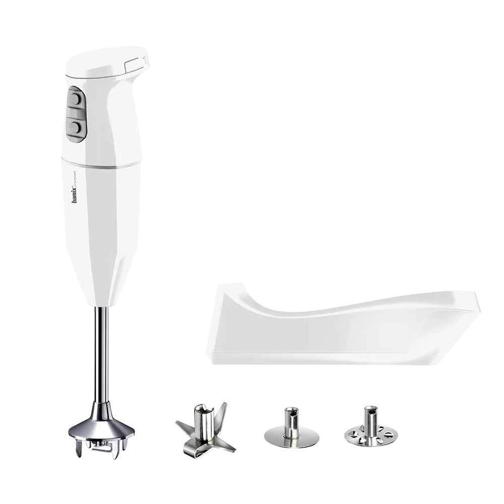 bamix Cordless in white with its charging base and three stainless steel attachments