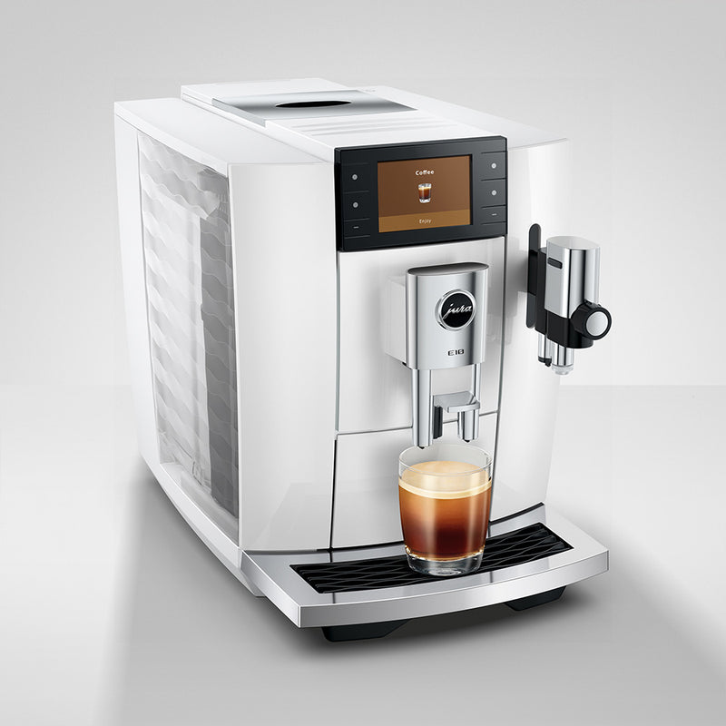 Jura E10 in Piano White from above, angled to the right, with a coffee