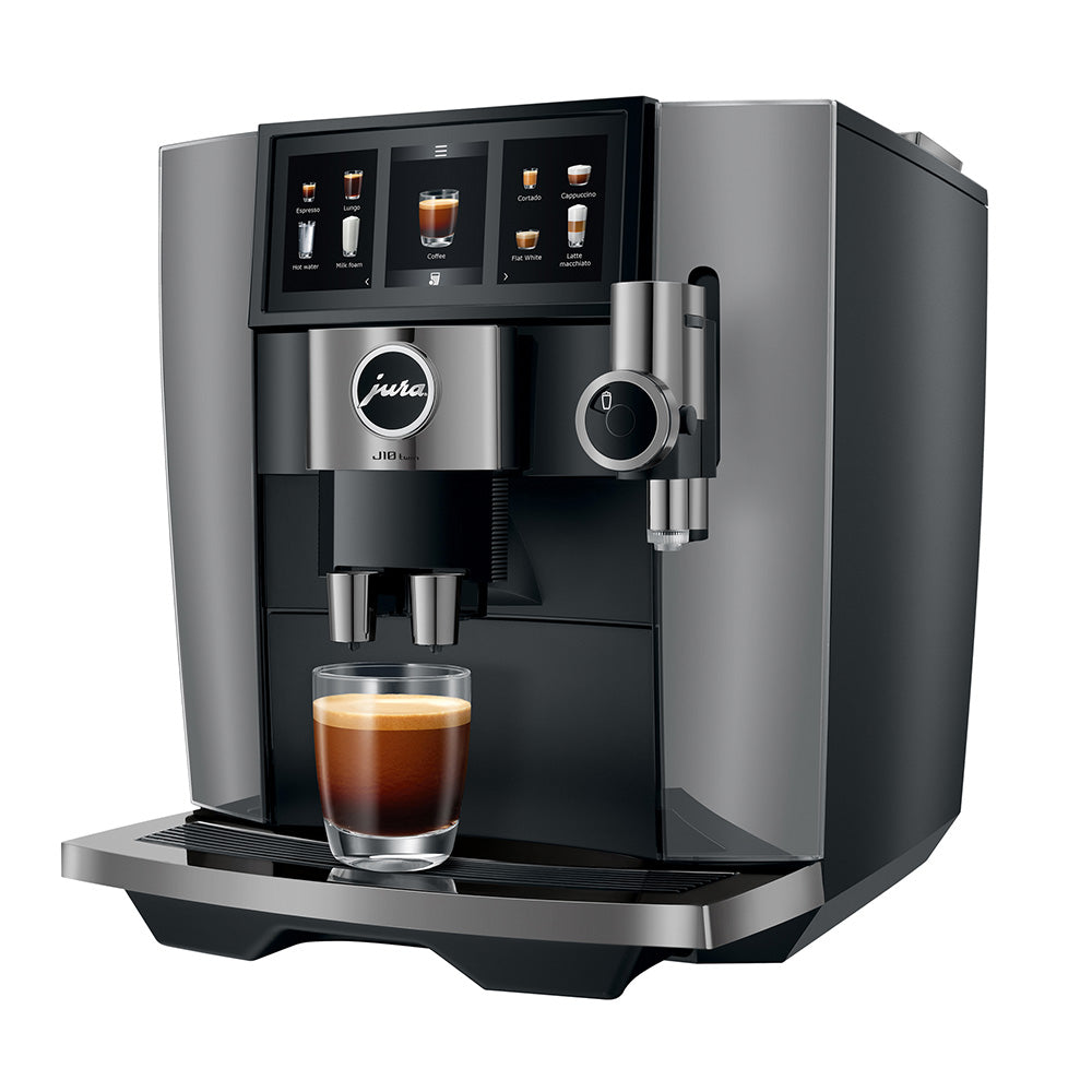 Jura J10 twin in Diamond Onyx, angled to the left, with an espresso