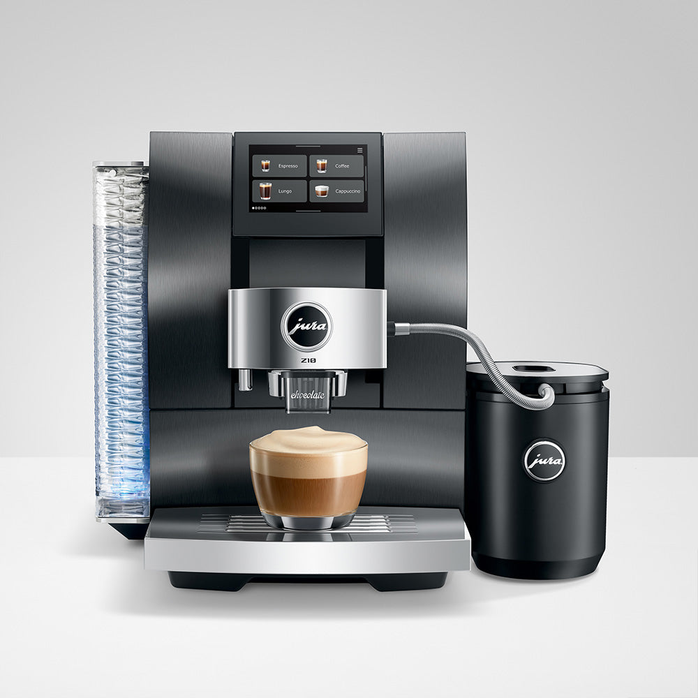 Jura Z10 Gen 2 Aluminum Black with a Jura milk cooler, preparing a cappuccino