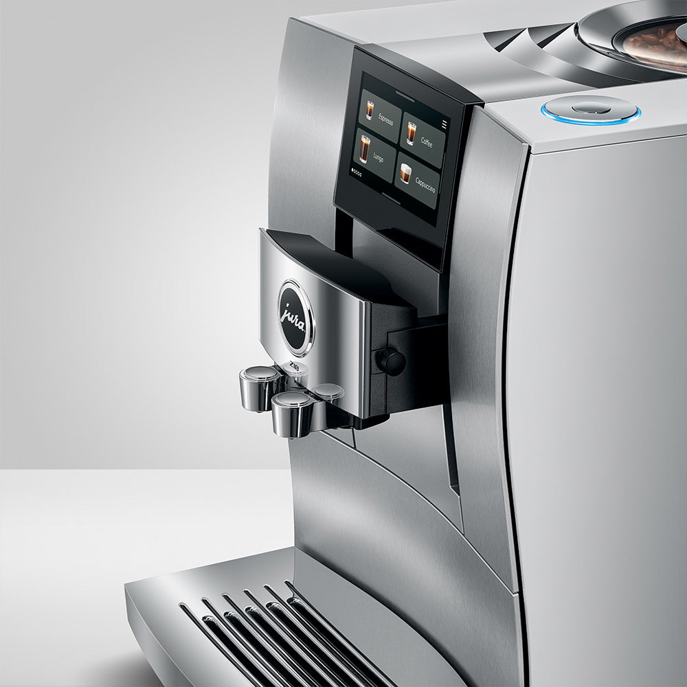 Jura Z10 Gen 2 Aluminum White, angled close-up of the dual spout and touchscreen