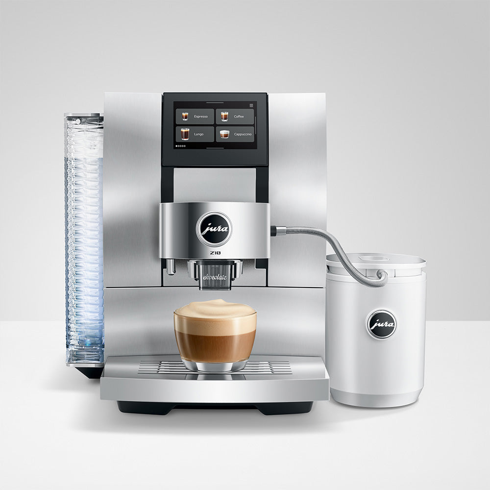 Jura Z10 Gen 2 Aluminum White with a Jura milk cooler, preparing a cappuccino