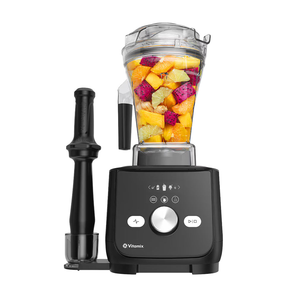 Vitamix Ascent X5 Blender in a dark finish with fresh fruit and the low-profile tamper