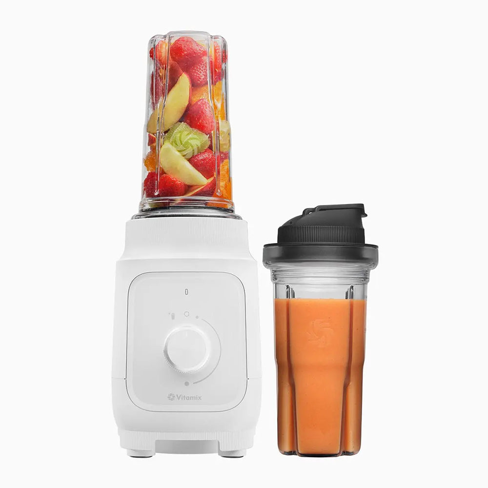 Vitamix Nano Personal Blender in White with fruit and a smoothie in a to-go cup