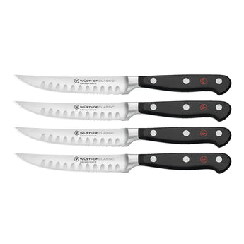 WÜSTHOF CLASSIC 4-Piece Hollow Edge Steak Knife Set on a white background