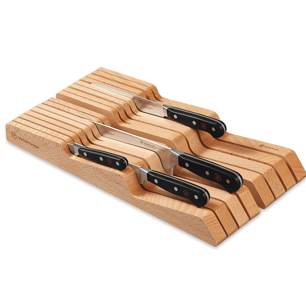 WÜSTHOF 14-Slot Wide In-Drawer Storage Tray holding black-handled knives, on a white background