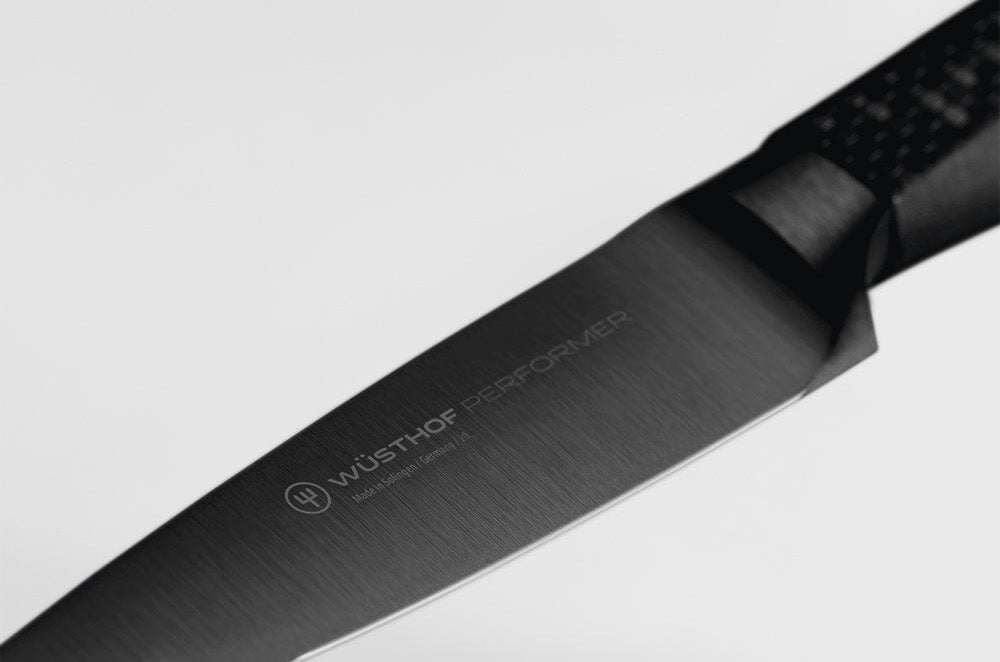 Close-up of the black blade and logo of the WÜSTHOF PERFORMER 3.5" Paring Knife