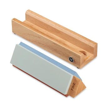 WÜSTHOF Tri-Stone Sharpener beside its empty wooden stand, on a white background