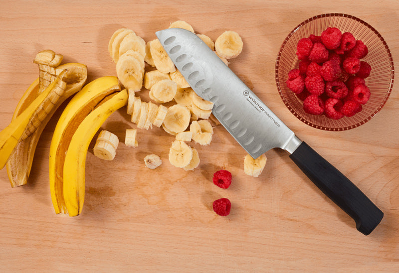 Wüsthof PARTNER 7" Hollow Edge Santoku - A Precise Alternative to a Chef's Knife