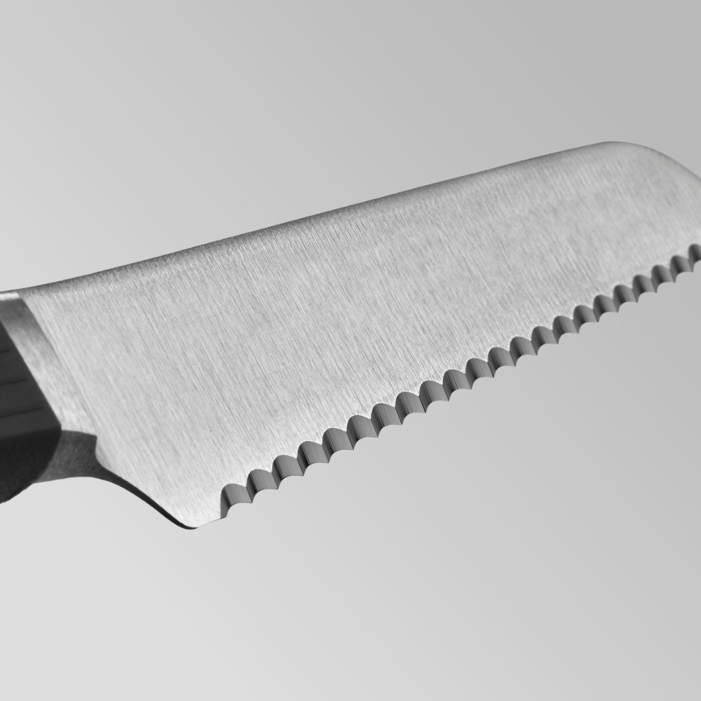 Close-up of the serrated edge of the WÜSTHOF PARTNER 8" Bread Knife