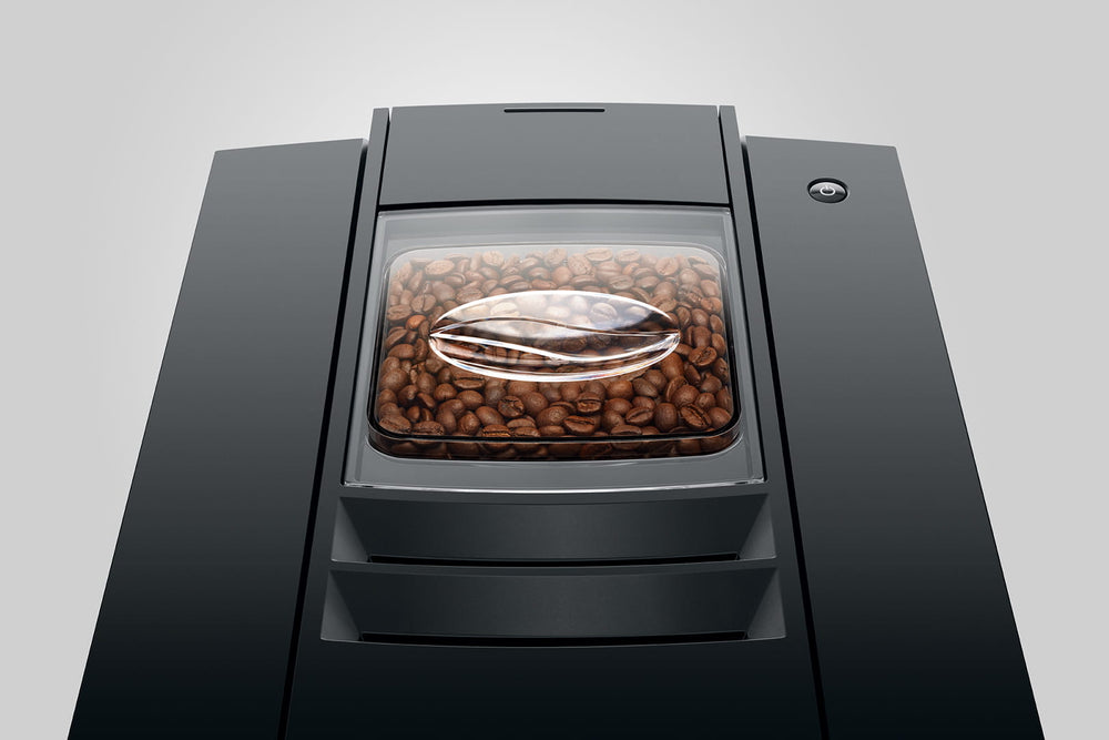 Jura E8 (4th generation) in Piano Black, from above, showing the bean container