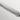 Close-up of the grey handle of a WÜSTHOF GOURMET knife from the spine side, showing the tang and red trident logo