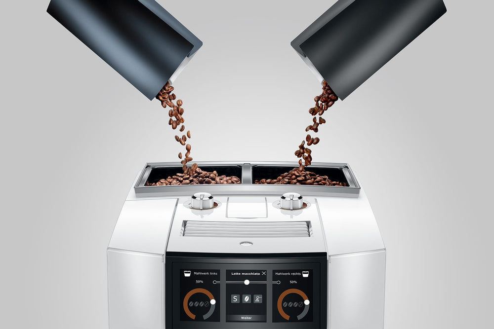 Jura J8 twin in Diamond White, coffee beans poured into both bean containers