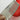 A di Alessi Parmenide Cheese Grater - Red/Ice/Black - Design and Grace